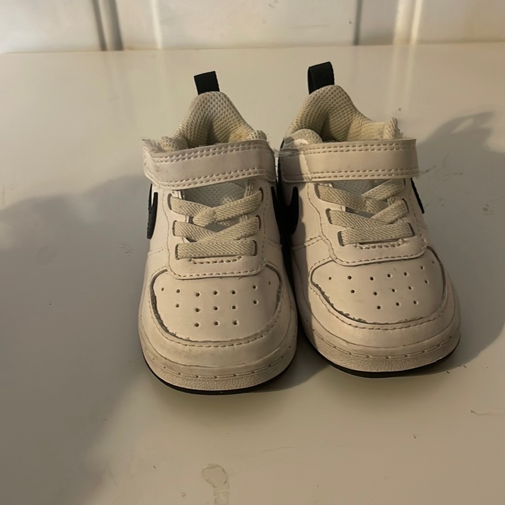 They are white with black